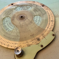 SOLD: The Ross Precision Spiral Slide Ruler Computer