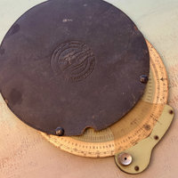 SOLD: The Ross Precision Spiral Slide Ruler Computer