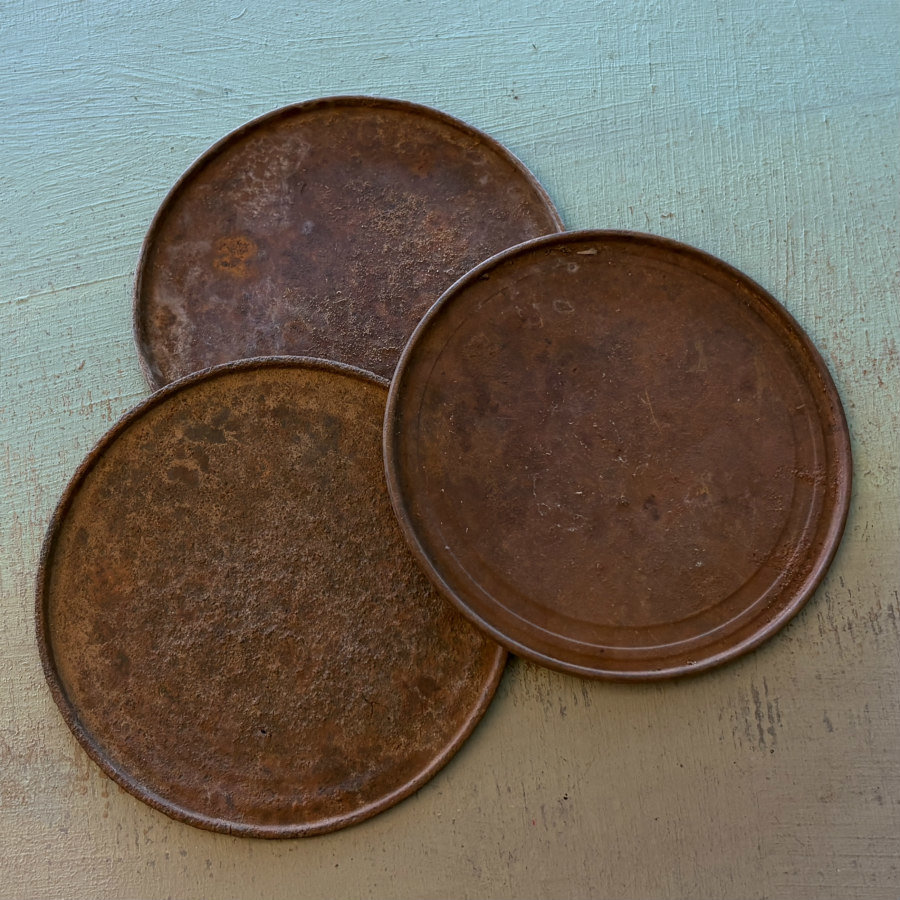 SOLD: Rusty Metal Lids Trio
